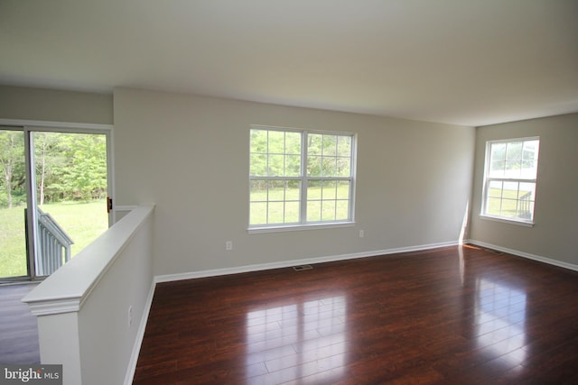 7 E Edgewater Ct, Sicklerville, NJ 08081 - unfurnished room with dark wood-style floors and baseboards