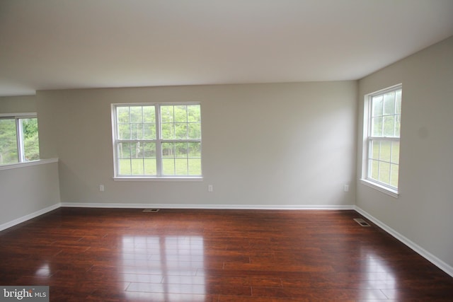 7 E Edgewater Ct, Sicklerville, NJ 08081 - empty room featuring dark wood-style flooring and baseboards