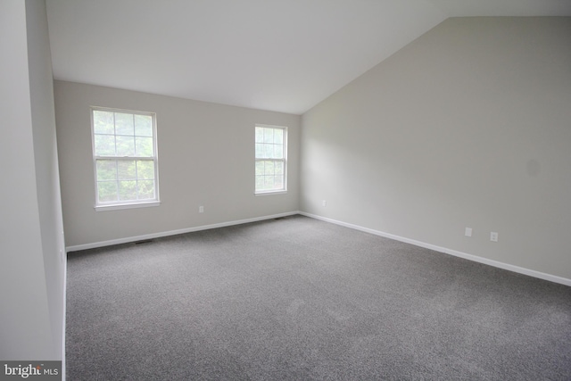 7 E Edgewater Ct, Sicklerville, NJ 08081 - empty room with lofted ceiling, dark colored carpet, and baseboards