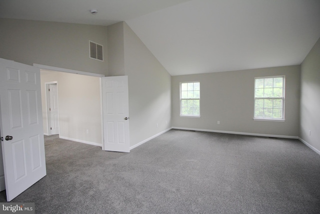 7 E Edgewater Ct, Sicklerville, NJ 08081 - spare room featuring dark colored carpet, baseboards, and high vaulted ceiling