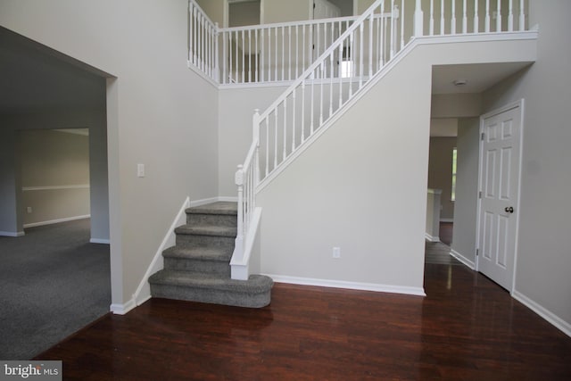 7 E Edgewater Ct, Sicklerville, NJ 08081 - stairway with a high ceiling, wood finished floors, and baseboards