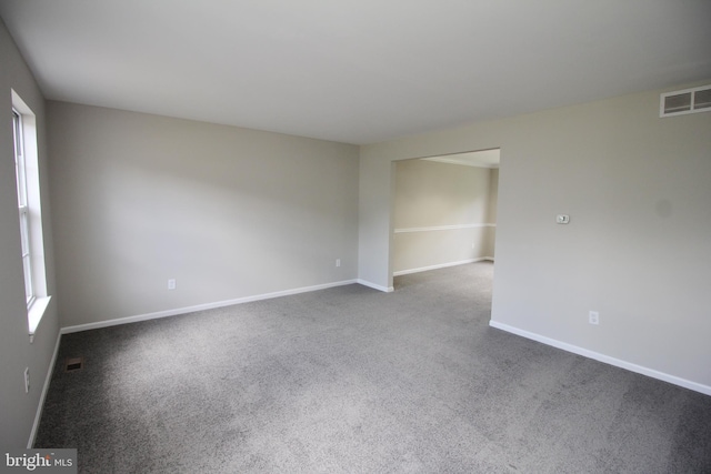 7 E Edgewater Ct, Sicklerville, NJ 08081 - empty room featuring dark colored carpet and baseboards
