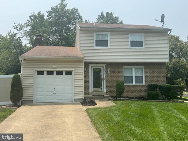 12513 Lampton Ln, Fort Washington, MD 20744 - view of front of house with a garage, a front yard, driveway, brick siding, and a chimney