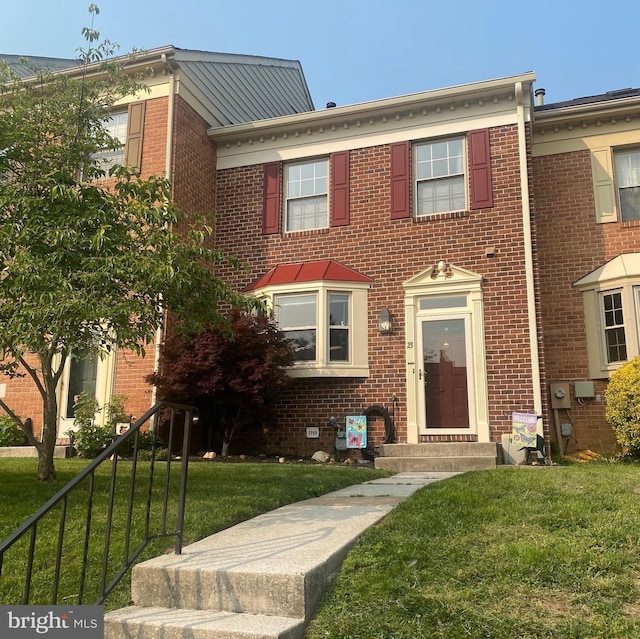 23 Meadow Run Ct, Sparks Glencoe, MD 21152 - view of front facade with brick siding and a front yard