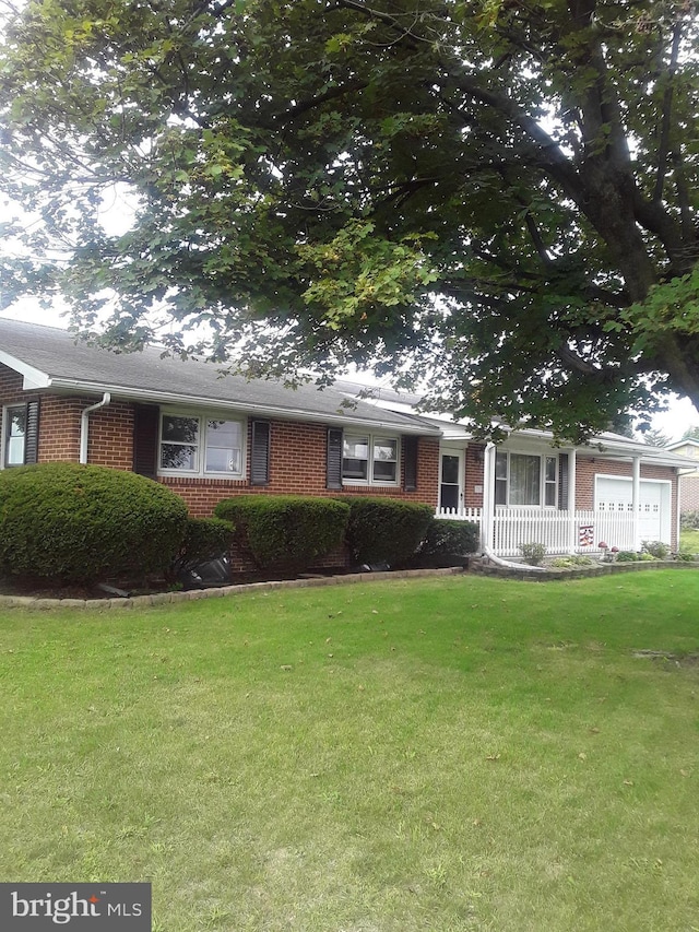 28 Kough Rd, Newville, PA 17241 - view of front of home featuring brick siding and a front lawn