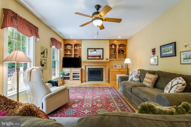 3525 Traveler Rd, Rockingham, VA 22801 - living area featuring a fireplace, ceiling fan, built in shelves, and recessed lighting