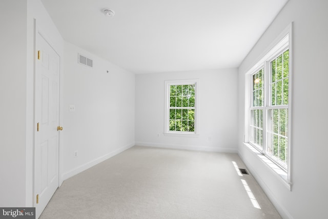 106 Gabrielle Ct Unit 8, Broomall, PA 19008 - unfurnished room with plenty of natural light, a smoke detector, light colored carpet, and baseboards
