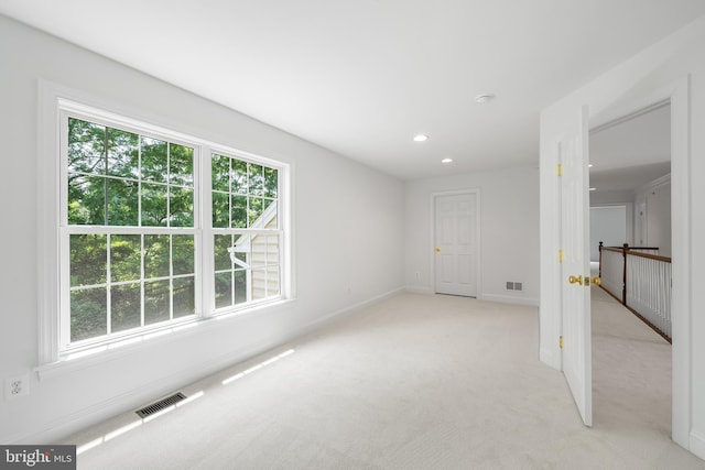 106 Gabrielle Ct Unit 8, Broomall, PA 19008 - spare room with healthy amount of natural light, light colored carpet, recessed lighting, and baseboards