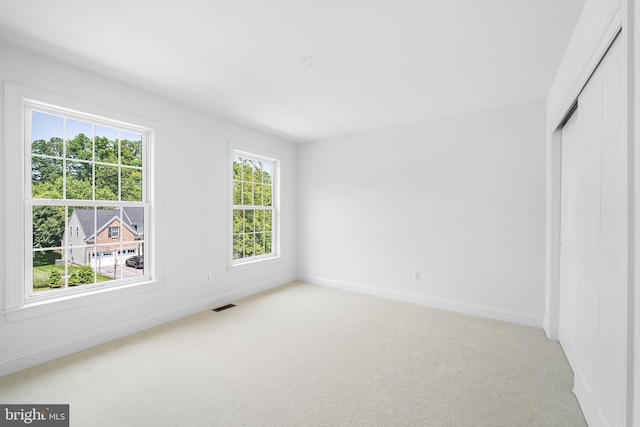 106 Gabrielle Ct Unit 8, Broomall, PA 19008 - unfurnished bedroom with baseboards, light colored carpet, and a closet