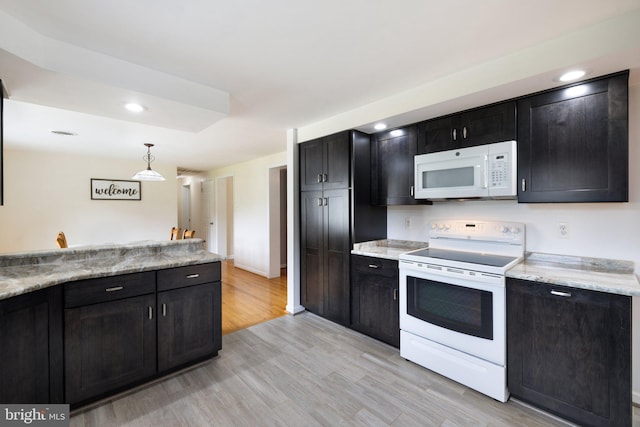 233 Kimble Rd, Berryville, VA 22611 - kitchen with white appliances, light wood-style flooring, dark cabinetry, pendant lighting, and recessed lighting