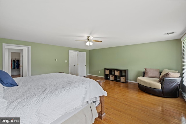 233 Kimble Rd, Berryville, VA 22611 - bedroom featuring wood finished floors, a ceiling fan, and a closet
