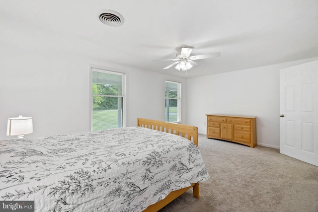 233 Kimble Rd, Berryville, VA 22611 - bedroom with light colored carpet and ceiling fan