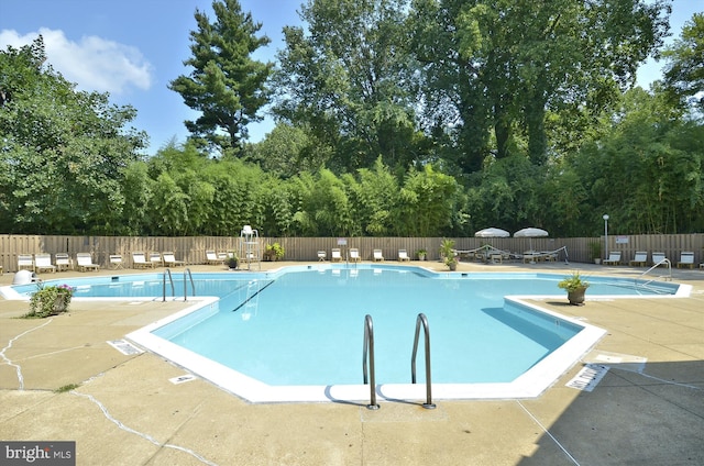 9039 Sligo Creek Pkwy Unit 102, Silver Spring, MD 20901 - community pool with a patio