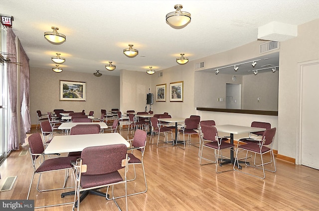 9039 Sligo Creek Pkwy Unit 102, Silver Spring, MD 20901 - dining space with wood finished floors