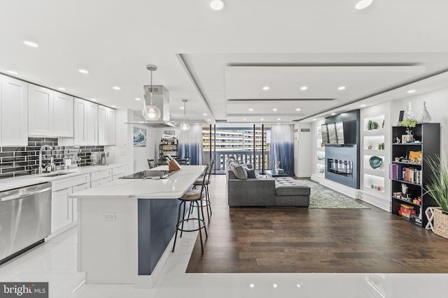 6101 Edsall Rd Unit 1111, Alexandria, VA 22304 - kitchen with dishwasher, a sink, island exhaust hood, white cabinetry, and a kitchen island