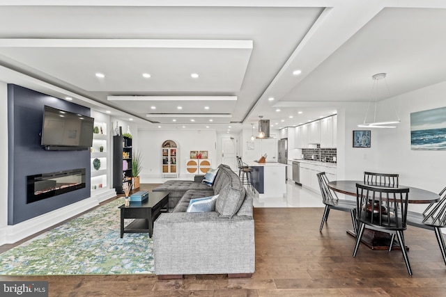 6101 Edsall Rd Unit 1111, Alexandria, VA 22304 - living area featuring recessed lighting, wood finished floors, and a glass covered fireplace