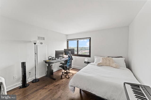 6101 Edsall Rd Unit 1111, Alexandria, VA 22304 - bedroom featuring wood finished floors, an office area, and baseboards