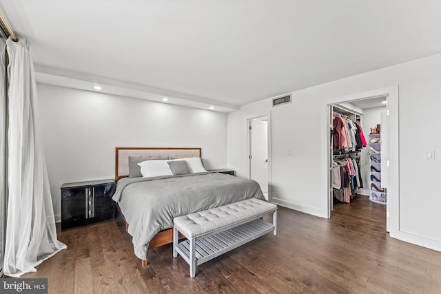 6101 Edsall Rd Unit 1111, Alexandria, VA 22304 - bedroom with wood finished floors, a walk in closet, recessed lighting, a closet, and baseboards