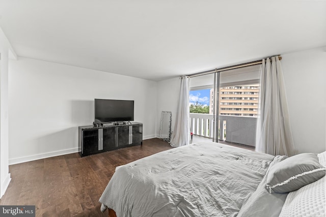 6101 Edsall Rd Unit 1111, Alexandria, VA 22304 - bedroom featuring access to exterior, wood finished floors, and baseboards