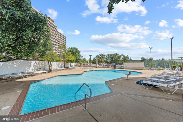6101 Edsall Rd Unit 1111, Alexandria, VA 22304 - community pool featuring a patio area