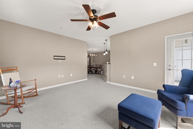 1412 Wigeon Way Unit 204, Gambrills, MD 21054 - living area featuring a ceiling fan, a chandelier, and carpet