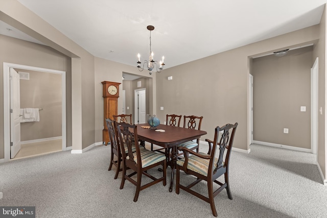 1412 Wigeon Way Unit 204, Gambrills, MD 21054 - dining area with light carpet and a chandelier