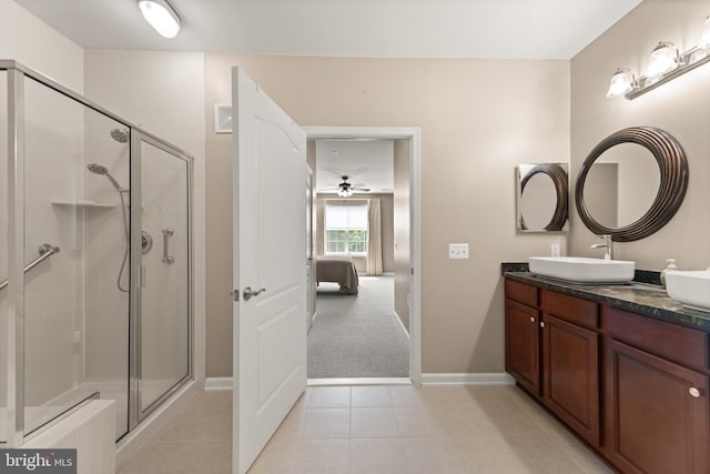 1412 Wigeon Way Unit 204, Gambrills, MD 21054 - ensuite bathroom featuring double vanity, a stall shower, a ceiling fan, and tile patterned floors
