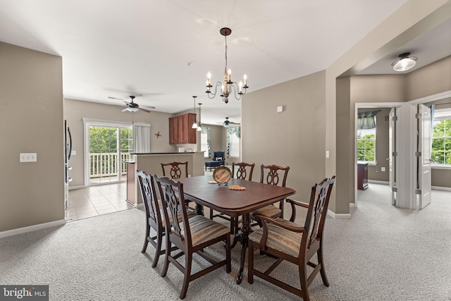 1412 Wigeon Way Unit 204, Gambrills, MD 21054 - dining area with ceiling fan, light carpet, and a chandelier