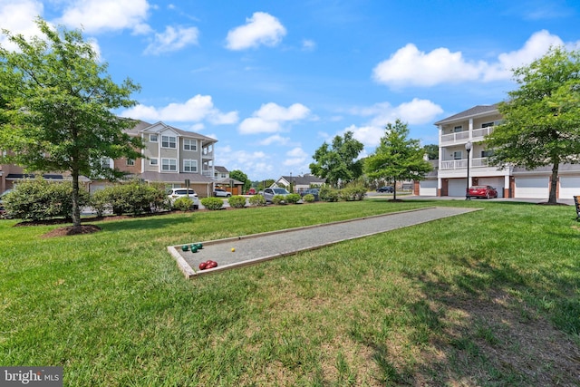 1412 Wigeon Way Unit 204, Gambrills, MD 21054 - view of home's community featuring a bocce ball area, a yard, and a residential view