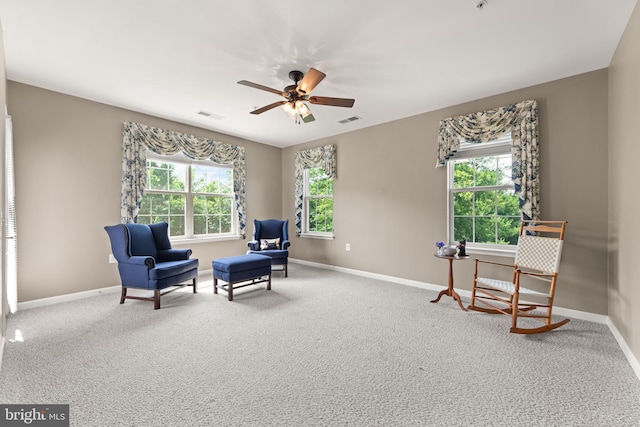 1412 Wigeon Way Unit 204, Gambrills, MD 21054 - living area featuring healthy amount of natural light, carpet floors, and a ceiling fan