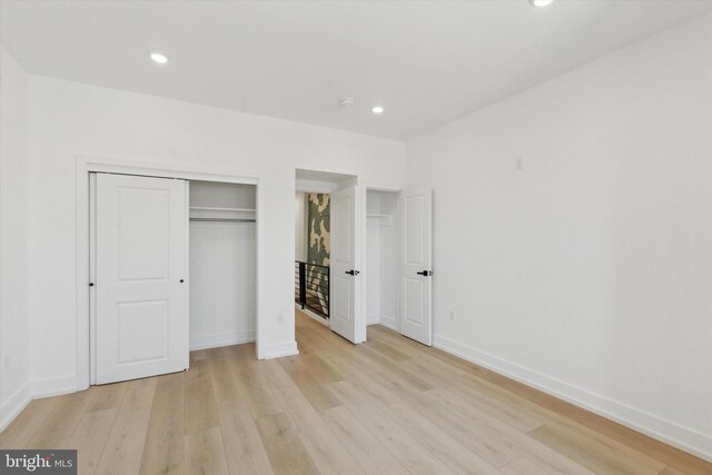 1910 E Atlantic St, Philadelphia, PA 19134 - unfurnished bedroom featuring light wood-style flooring, baseboards, and recessed lighting