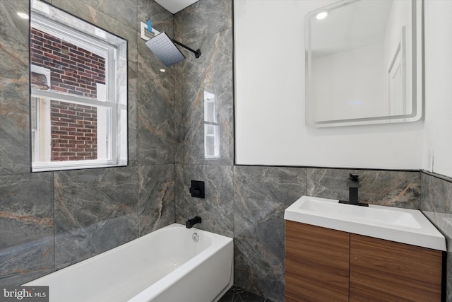 1910 E Atlantic St, Philadelphia, PA 19134 - full bath featuring tile walls, vanity, and washtub / shower combination