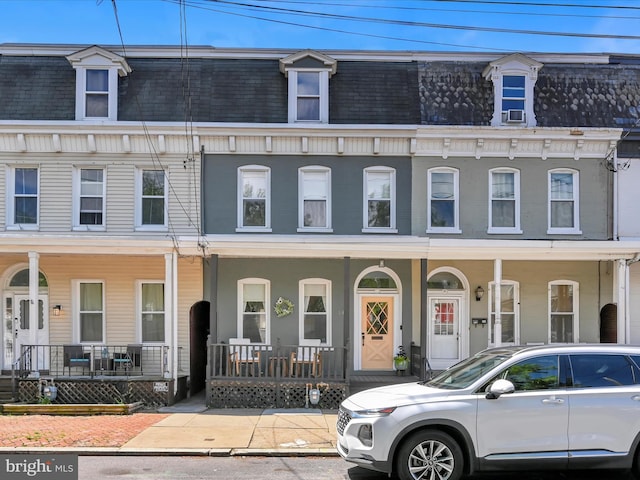 142 E New St, Lancaster, PA 17602 - multi unit property featuring mansard roof and covered porch