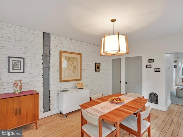 142 E New St, Lancaster, PA 17602 - dining area featuring light wood-type flooring and radiator heating unit