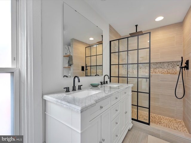 142 E New St, Lancaster, PA 17602 - full bathroom featuring double vanity, a walk in shower, and recessed lighting
