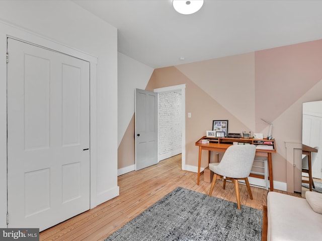 142 E New St, Lancaster, PA 17602 - home office with wood finished floors, baseboards, and vaulted ceiling