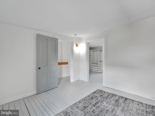 142 E New St, Lancaster, PA 17602 - unfurnished room featuring baseboards and light wood-style flooring
