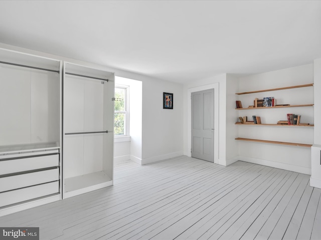 142 E New St, Lancaster, PA 17602 - unfurnished bedroom with light wood-style floors and baseboards