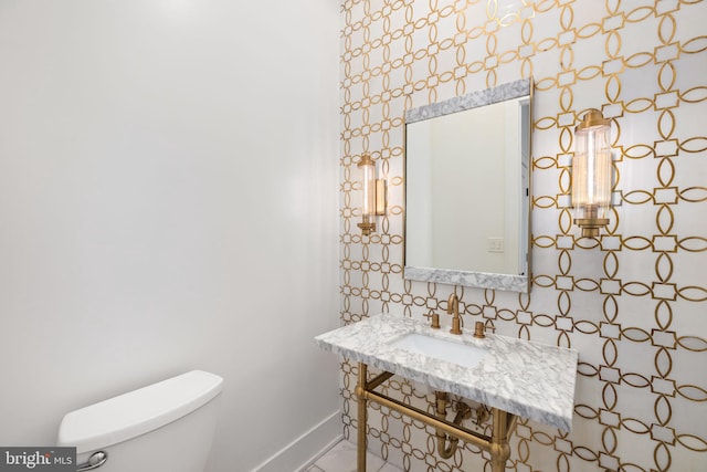 3904 Dresden St, Kensington, MD 20895 - bathroom with toilet, a sink, and baseboards