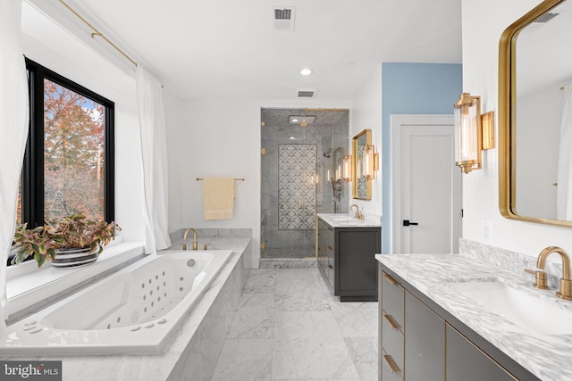 3904 Dresden St, Kensington, MD 20895 - bathroom featuring a stall shower, two vanities, a tub with jets, marble finish flooring, and recessed lighting