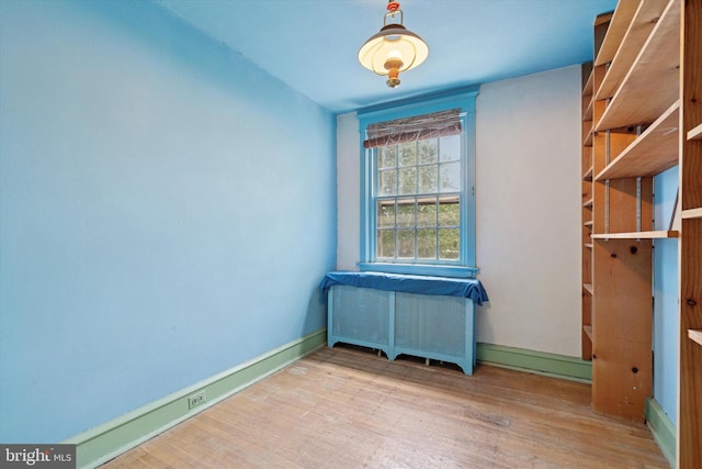 340 W Durham St, Philadelphia, PA 19119 - unfurnished bedroom featuring wood finished floors, radiator, and baseboards