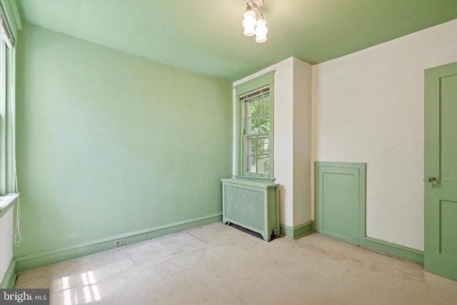 340 W Durham St, Philadelphia, PA 19119 - empty room with radiator, baseboards, and light carpet
