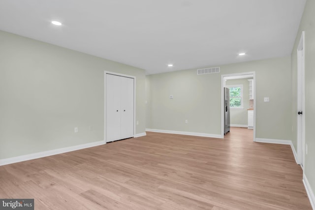 318 Mayfield Ct, Westminster, MD 21158 - empty room with light wood-type flooring, baseboards, and recessed lighting