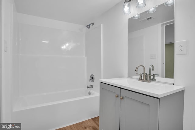 318 Mayfield Ct, Westminster, MD 21158 - full bathroom featuring vanity, tub / shower combination, and wood finished floors