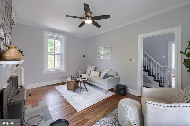 143 Hanover St, Glen Rock, PA 17327 - living area featuring wood finished floors, a ceiling fan, baseboards, stairway, and crown molding