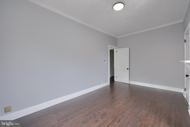 143 Hanover St, Glen Rock, PA 17327 - unfurnished room with dark wood-type flooring, ornamental molding, and baseboards