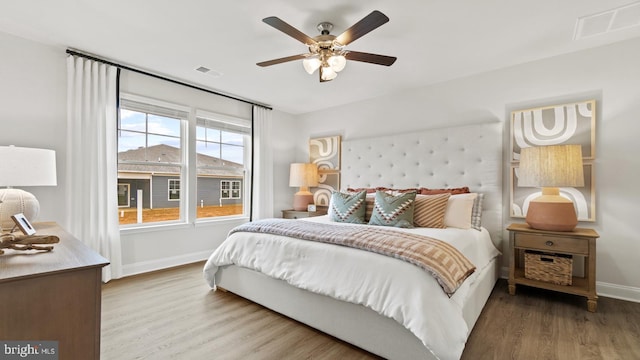 7 Florence Sarah Ln, Lexington City, VA 24450 - bedroom with baseboards, wood finished floors, and a ceiling fan