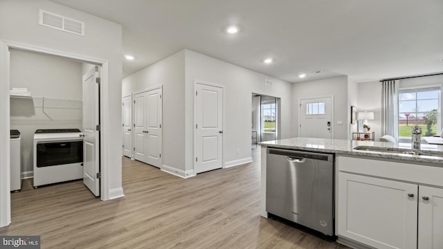 7 Florence Sarah Ln, Lexington City, VA 24450 - kitchen featuring dishwasher, stove, light stone counters, independent washer and dryer, and light wood-type flooring