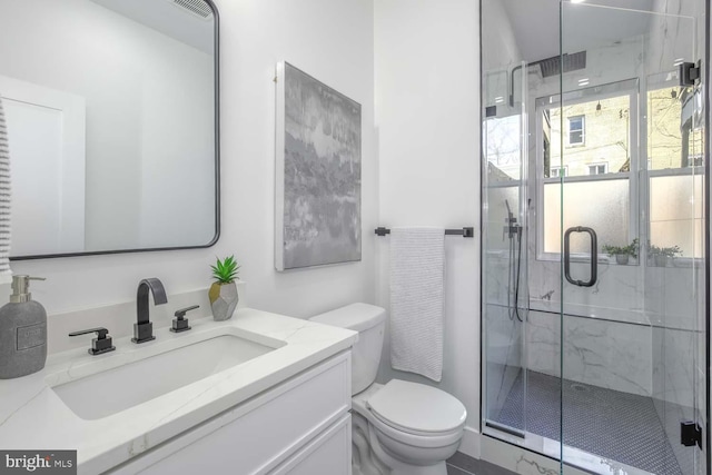 5403 5th St NW Unit 1, Washington, DC 20011 - full bathroom with toilet, vanity, and a marble finish shower