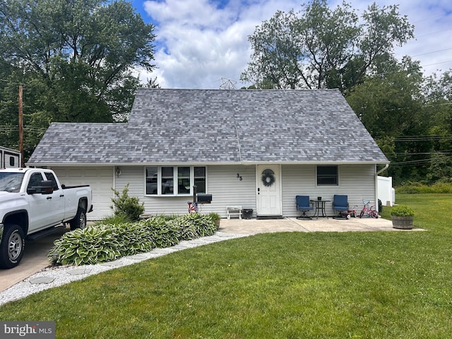 35 Long Loop Rd, Levittown, PA 19056 - view of front of property with a garage, a shingled roof, and a front lawn